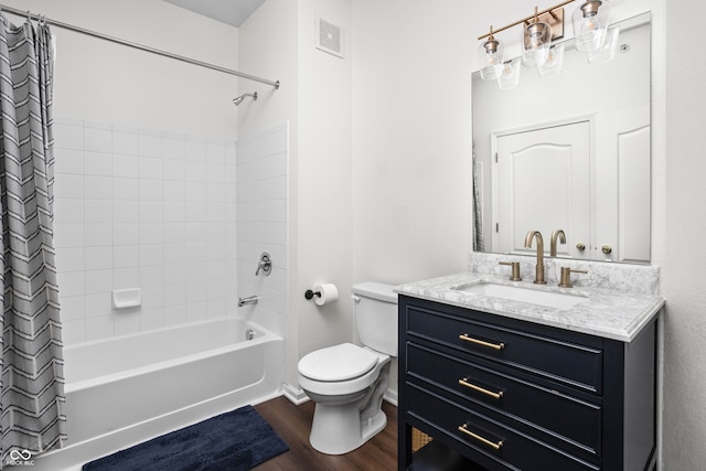 full bathroom with hardwood / wood-style flooring, vanity, toilet, and shower / bathtub combination with curtain