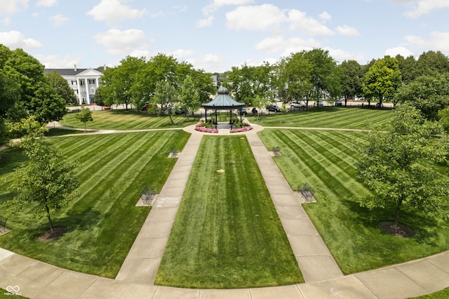 view of community featuring a gazebo and a yard