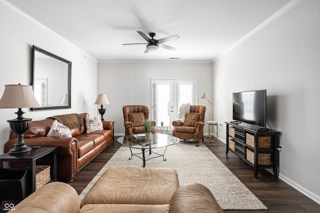 living room featuring ceiling fan, dark hardwood / wood-style flooring, ornamental molding, and french doors