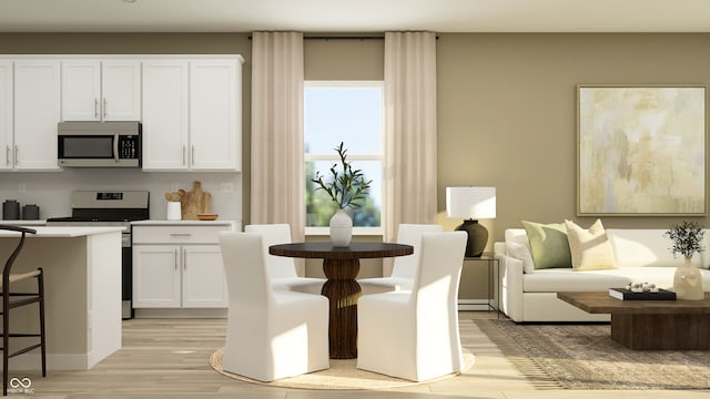 dining room featuring light wood-type flooring