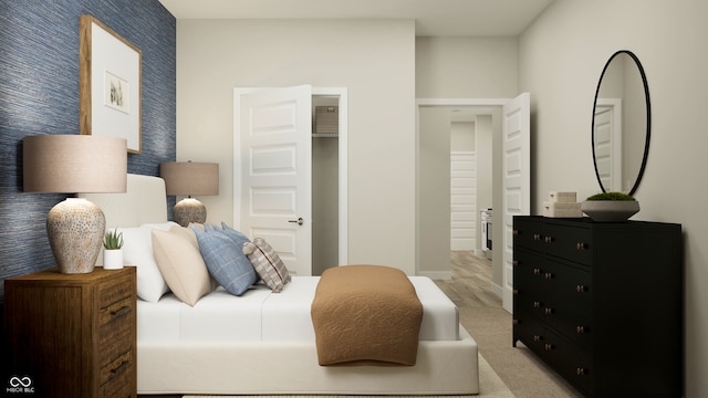 bedroom featuring a closet and a spacious closet