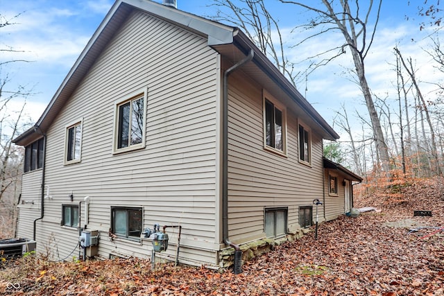 view of property exterior featuring central AC