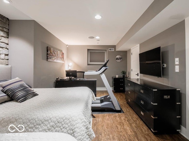 bedroom featuring hardwood / wood-style flooring