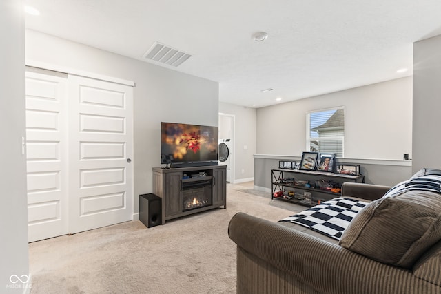 living room featuring light colored carpet