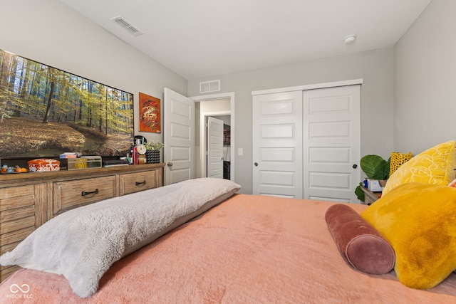 carpeted bedroom with a closet