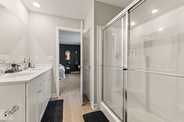 bathroom with vanity and walk in shower