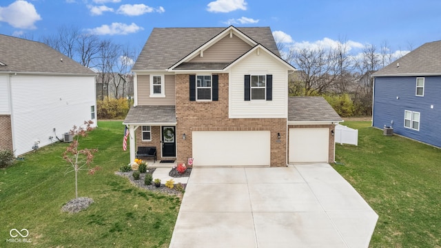 front of property featuring central AC unit, a front lawn, and a garage