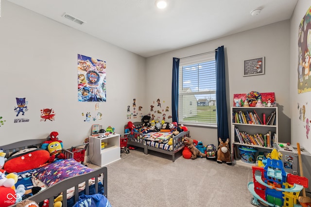 bedroom featuring carpet