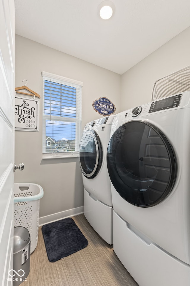 laundry room featuring washing machine and dryer