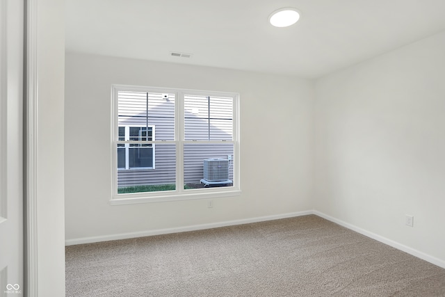 spare room with carpet flooring