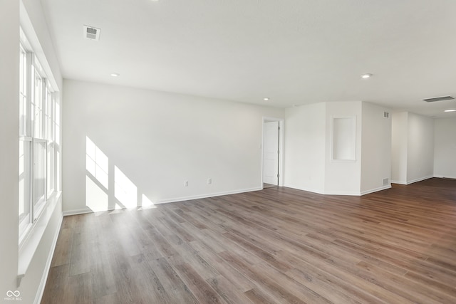 spare room featuring light hardwood / wood-style flooring