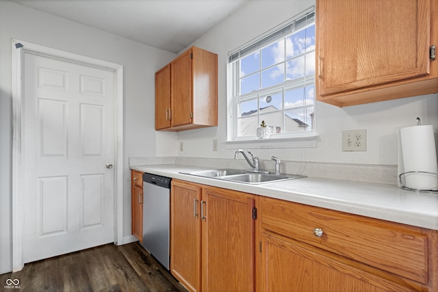 kitchen with dishwasher, dark wood-type flooring, and sink