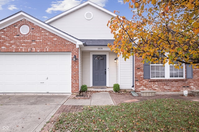 view of front of property with a garage