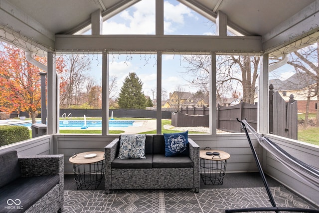 sunroom with lofted ceiling