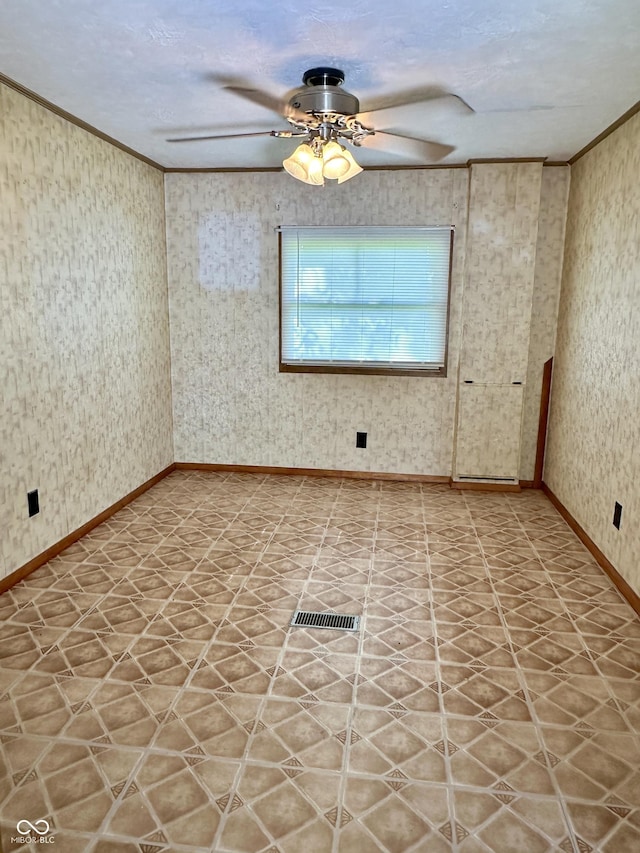 8418 S State Road 39, Clayton, IN 46118 - empty room with ceiling fan, crown molding, and baseboards