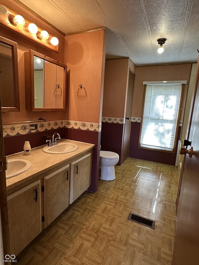 8418 S State Road 39, Clayton, IN 46118 - bathroom featuring double vanity and toilet