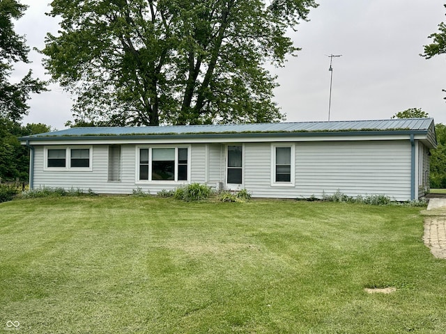 8418 S State Road 39, Clayton, IN 46118 - back of house with a yard and metal roof