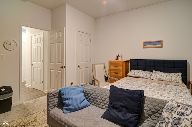 bedroom featuring wood-type flooring