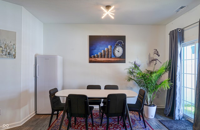 dining area featuring hardwood / wood-style flooring