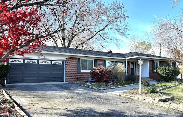 single story home with a garage