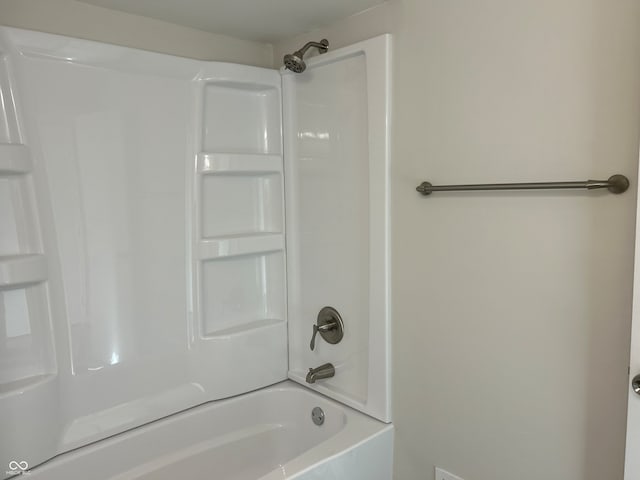 bathroom featuring washtub / shower combination