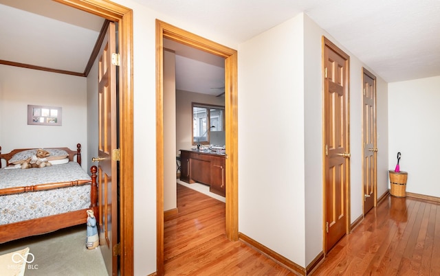 corridor featuring light hardwood / wood-style floors