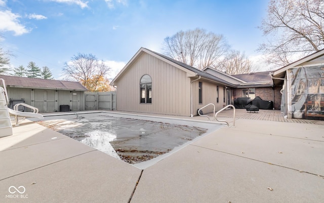 back of house with a patio