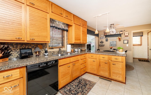 kitchen with kitchen peninsula, tasteful backsplash, ceiling fan, black dishwasher, and sink