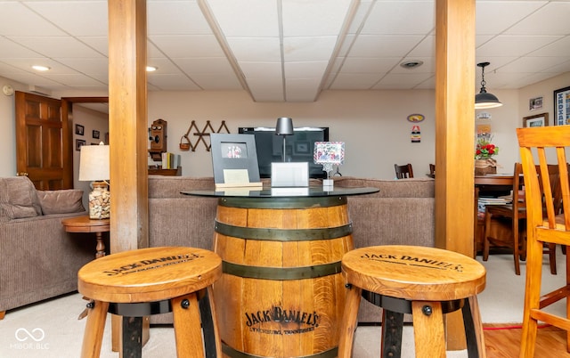 bar featuring pendant lighting