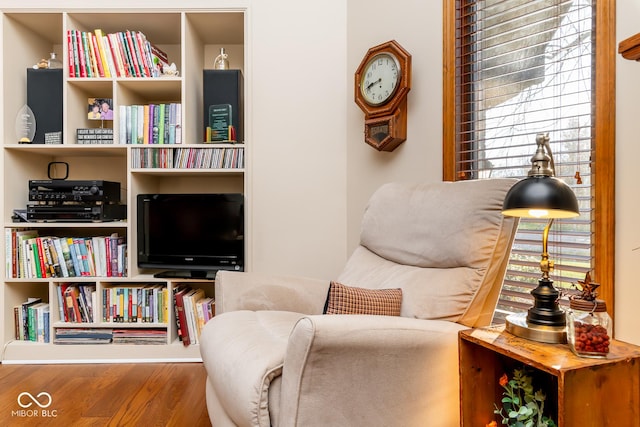 sitting room featuring hardwood / wood-style flooring