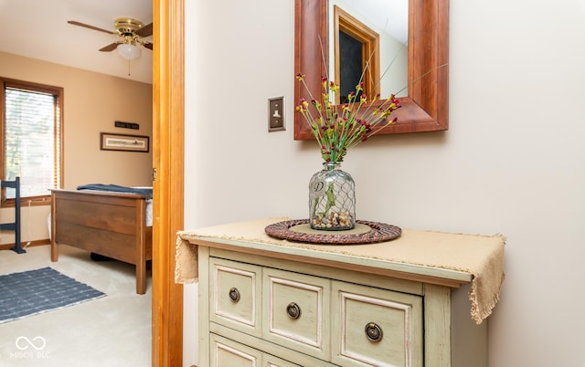 interior space featuring ceiling fan