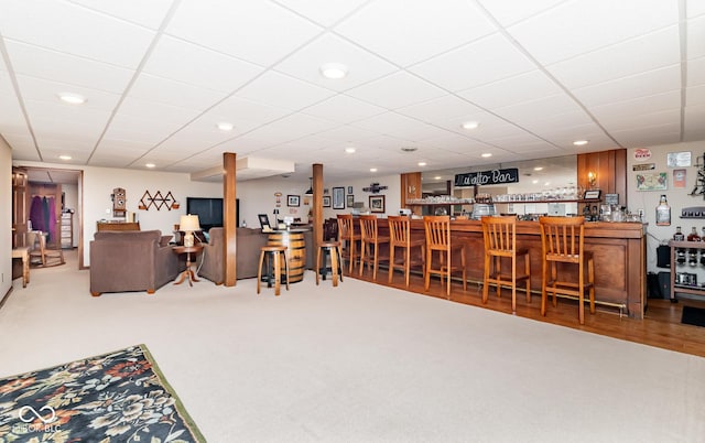 interior space featuring indoor bar