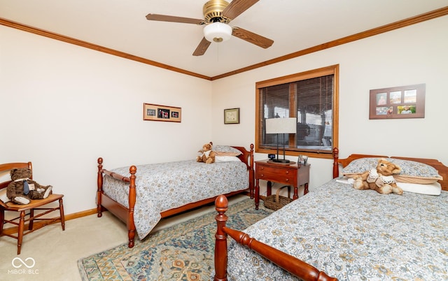 bedroom featuring ornamental molding, light colored carpet, and ceiling fan