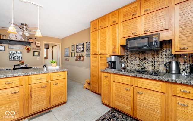 kitchen featuring black appliances, ceiling fan, decorative backsplash, stone countertops, and light tile patterned flooring