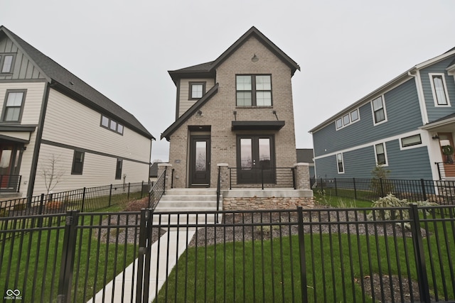 view of front of home featuring a front yard