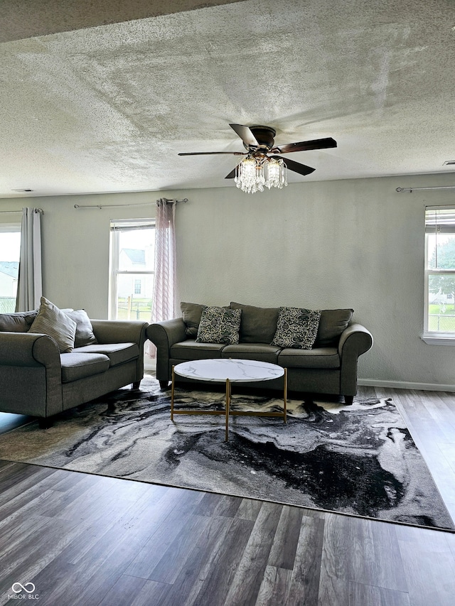 living room featuring hardwood / wood-style floors and a healthy amount of sunlight