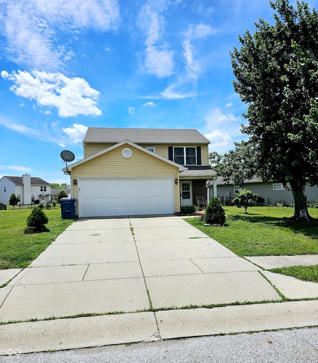 view of front property with a garage and a front lawn