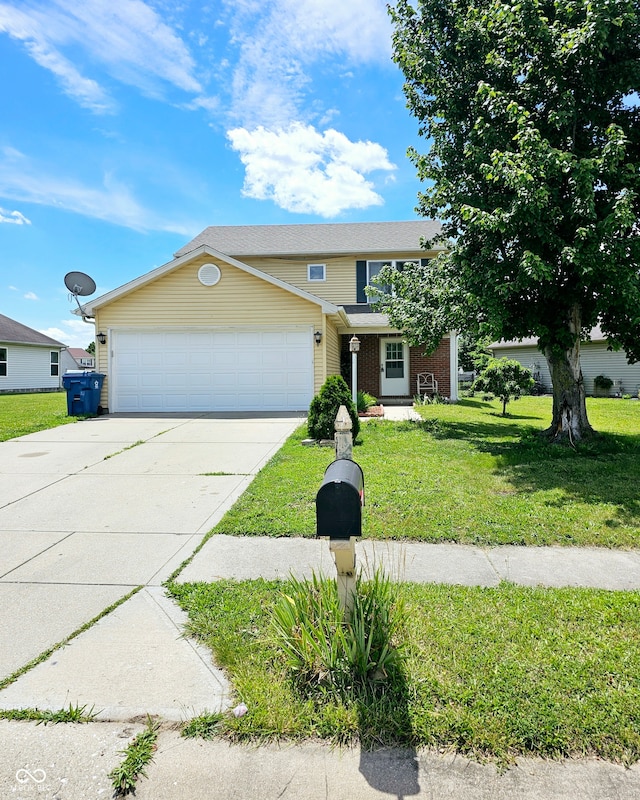 front of property with a garage and a front lawn