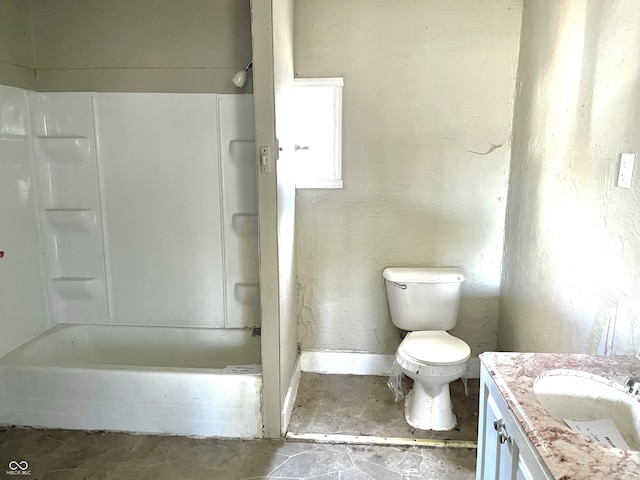 full bathroom featuring shower / bathing tub combination, toilet, and vanity