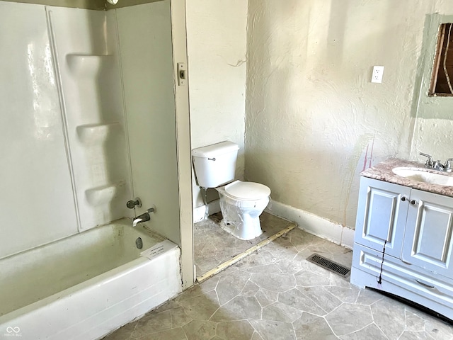 full bathroom with tub / shower combination, toilet, and vanity