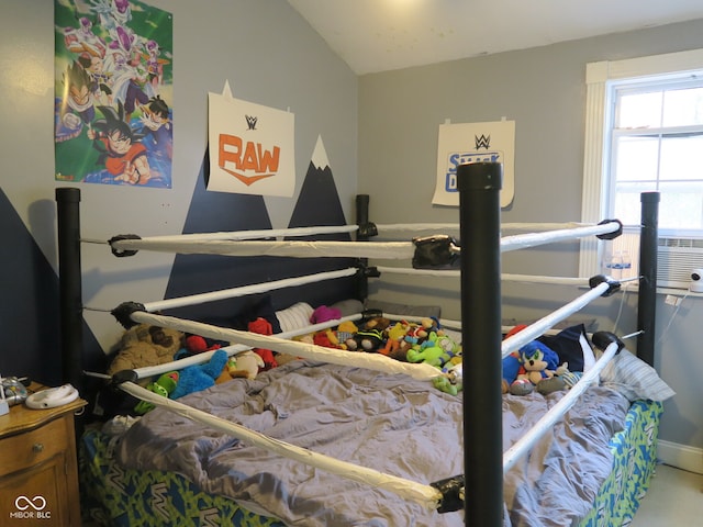 bedroom featuring lofted ceiling