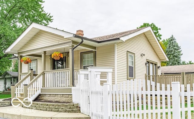 view of front of property featuring covered porch