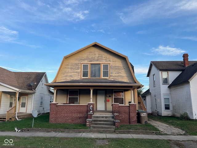 bungalow-style house featuring covered porch