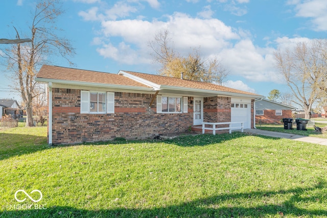 single story home with a garage and a front lawn