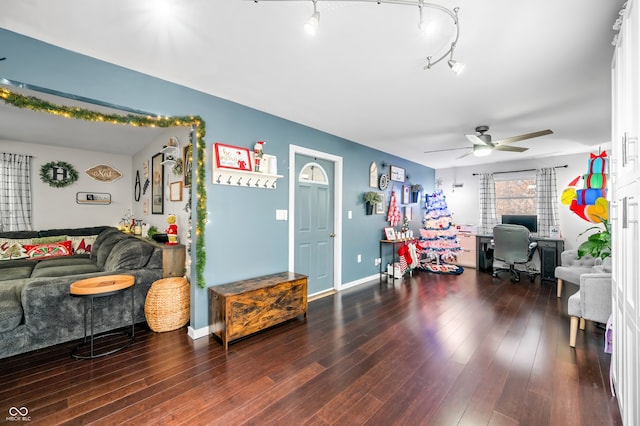 interior space with dark hardwood / wood-style floors and ceiling fan