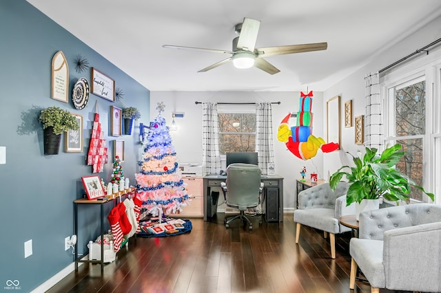 office area featuring dark hardwood / wood-style floors, a healthy amount of sunlight, and ceiling fan