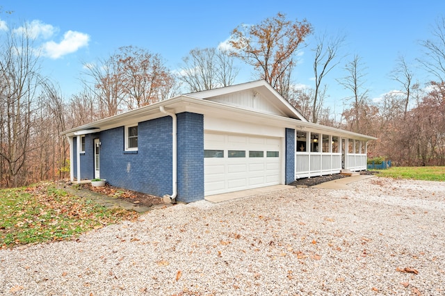 view of side of property featuring a garage