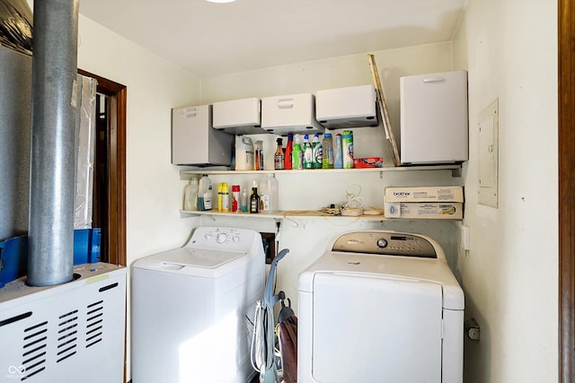 washroom with washer and dryer