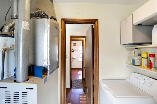 laundry area with washer / dryer and hardwood / wood-style flooring