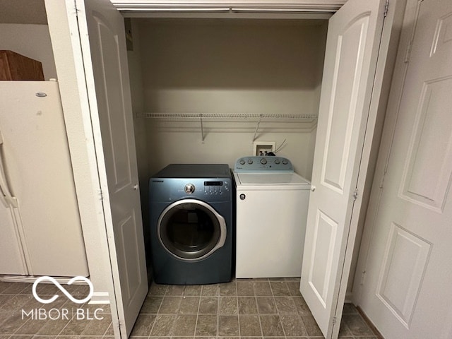 laundry area featuring independent washer and dryer